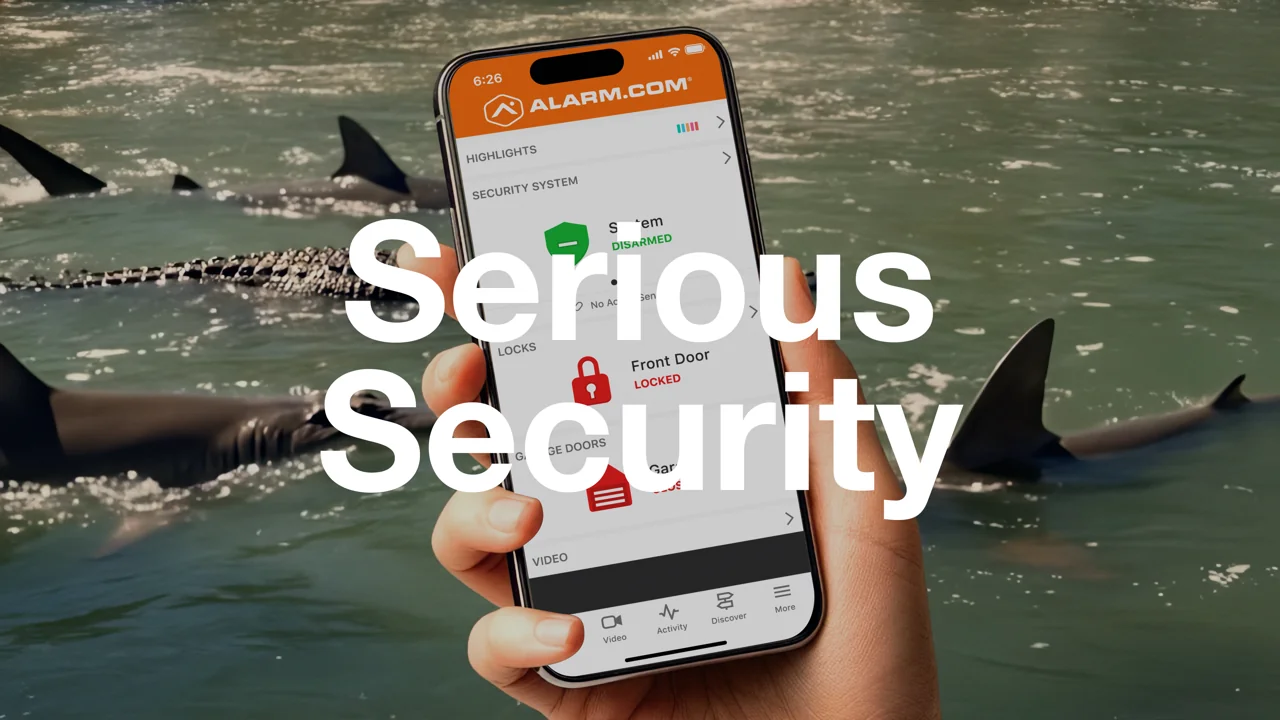 Alarm.com Serious Security campaign featuring a phone and sharks